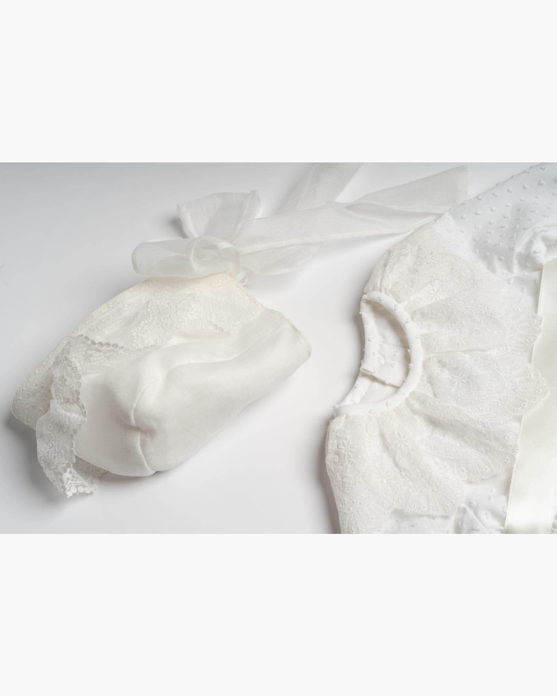 Long christening gown with lace collar and bottom