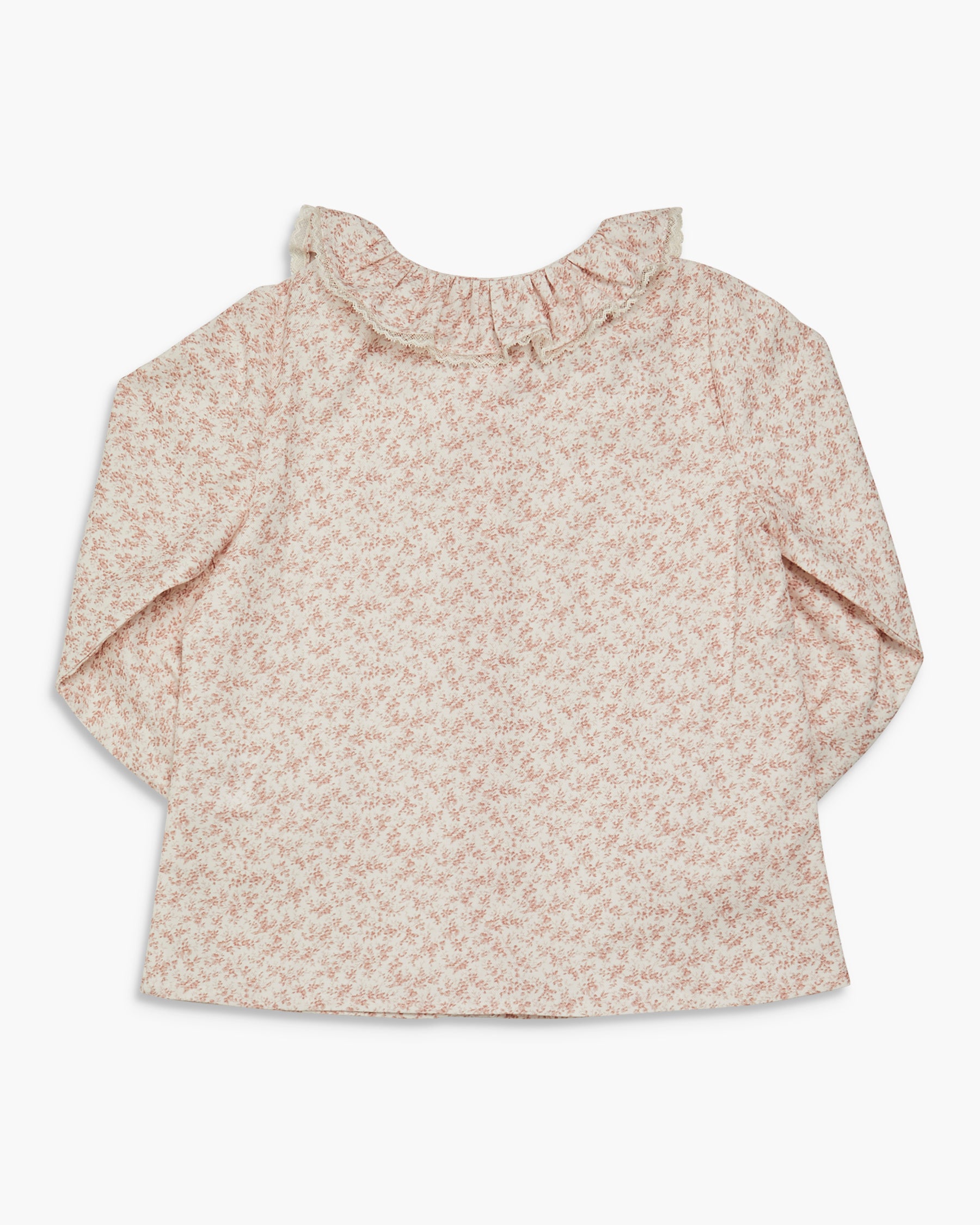 Floral patterned blouse on a white background