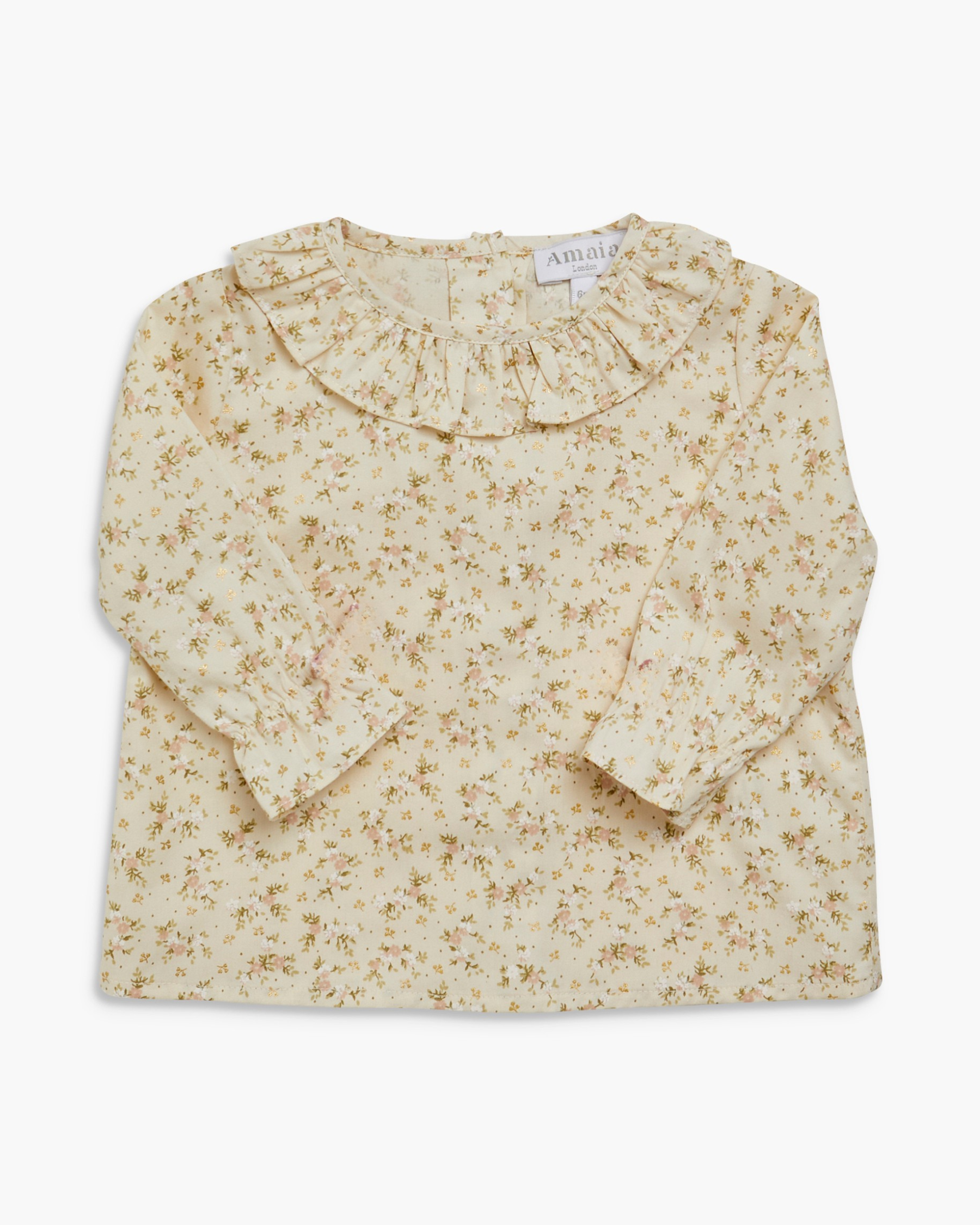 Floral blouse with ruffled collar on a white background