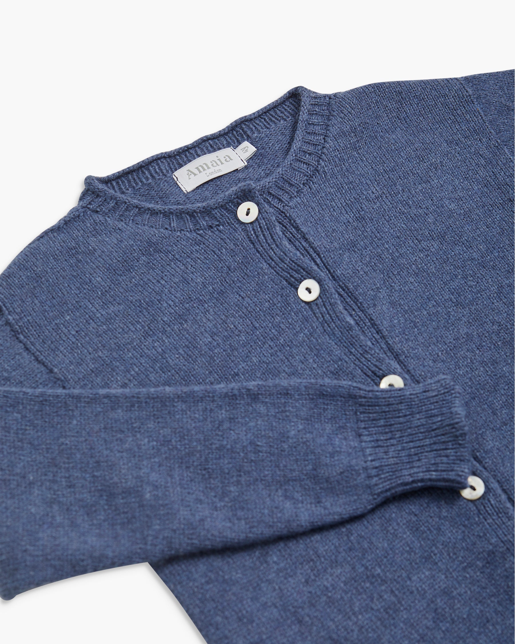 Collar of the blue cardigan for girls