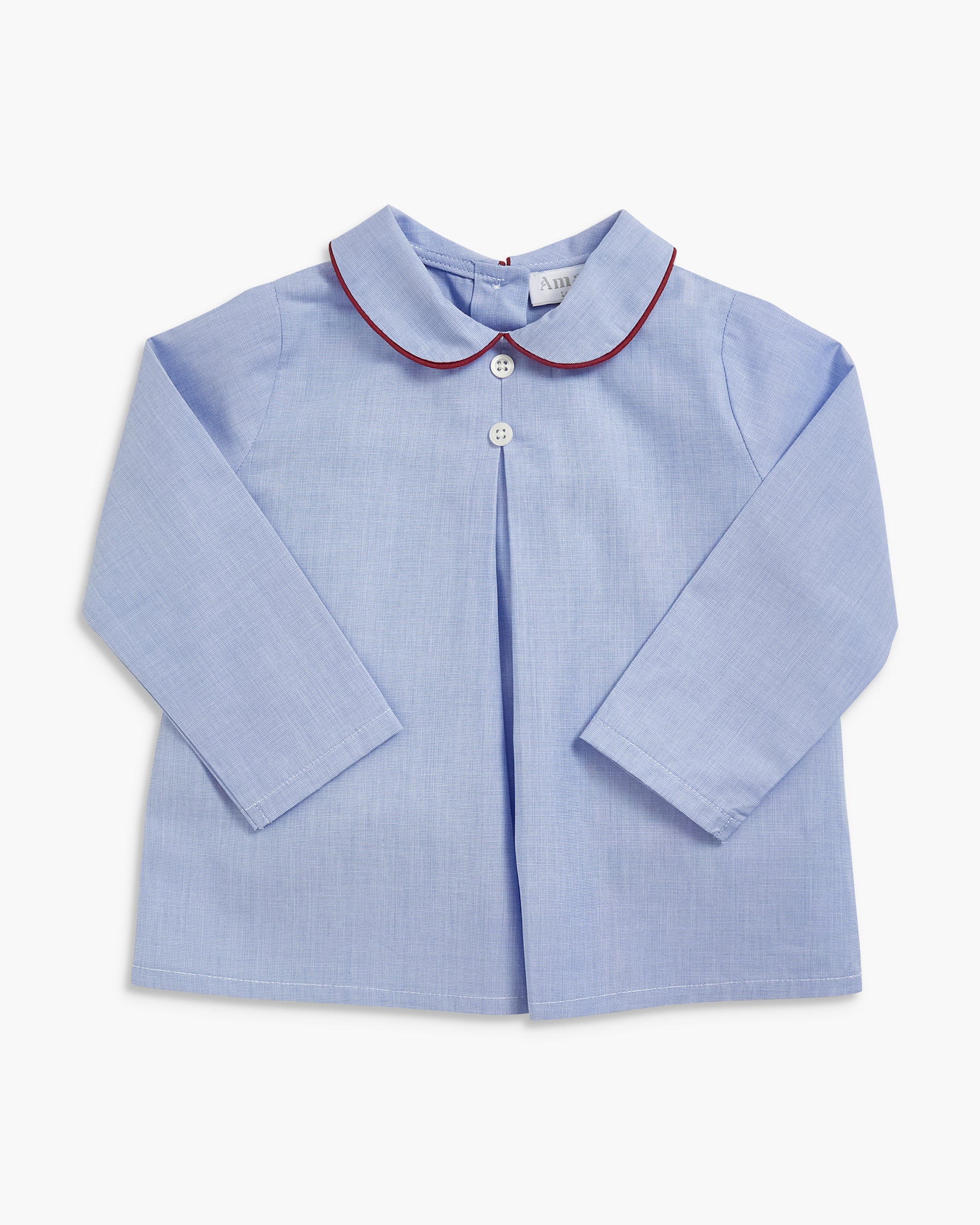 A light blue long-sleeve children's shirt with a Peter Pan collar and a thin red piping trim, shown flat on a light background.