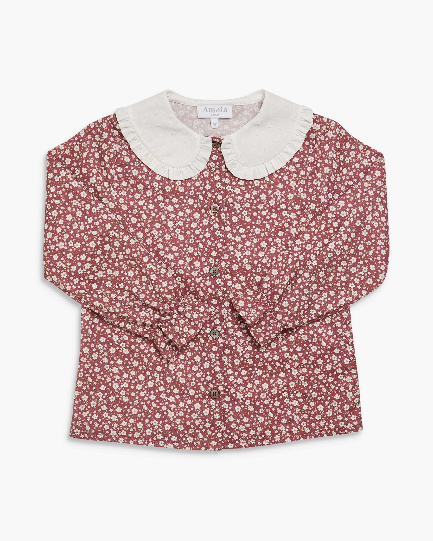 Floral blouse with a white collar on a white background