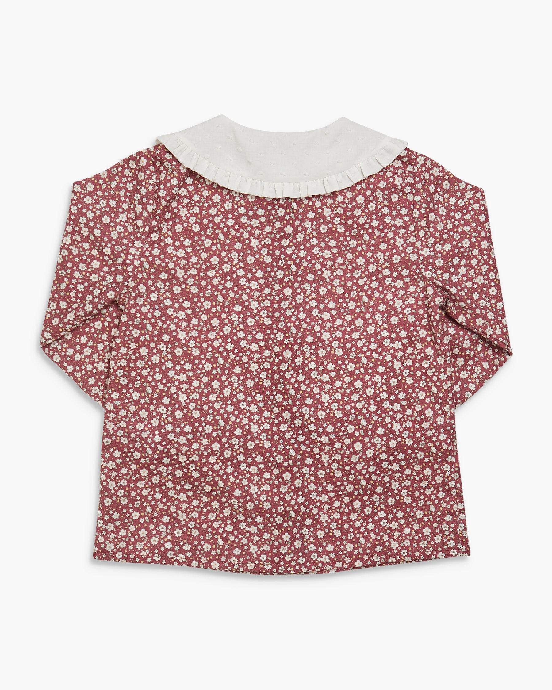 Floral blouse with a white collar on a white background