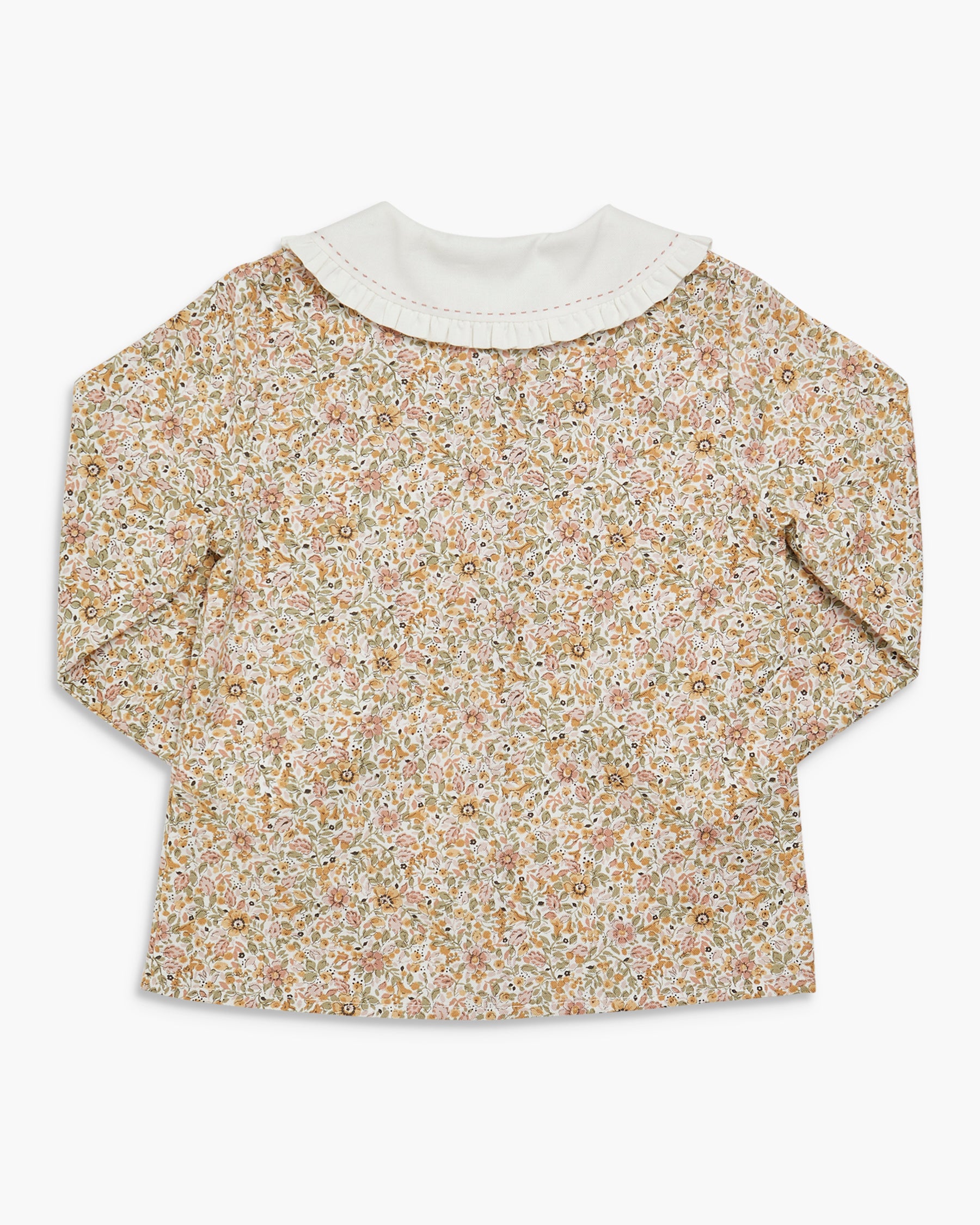 Floral blouse with a white collar on a white background