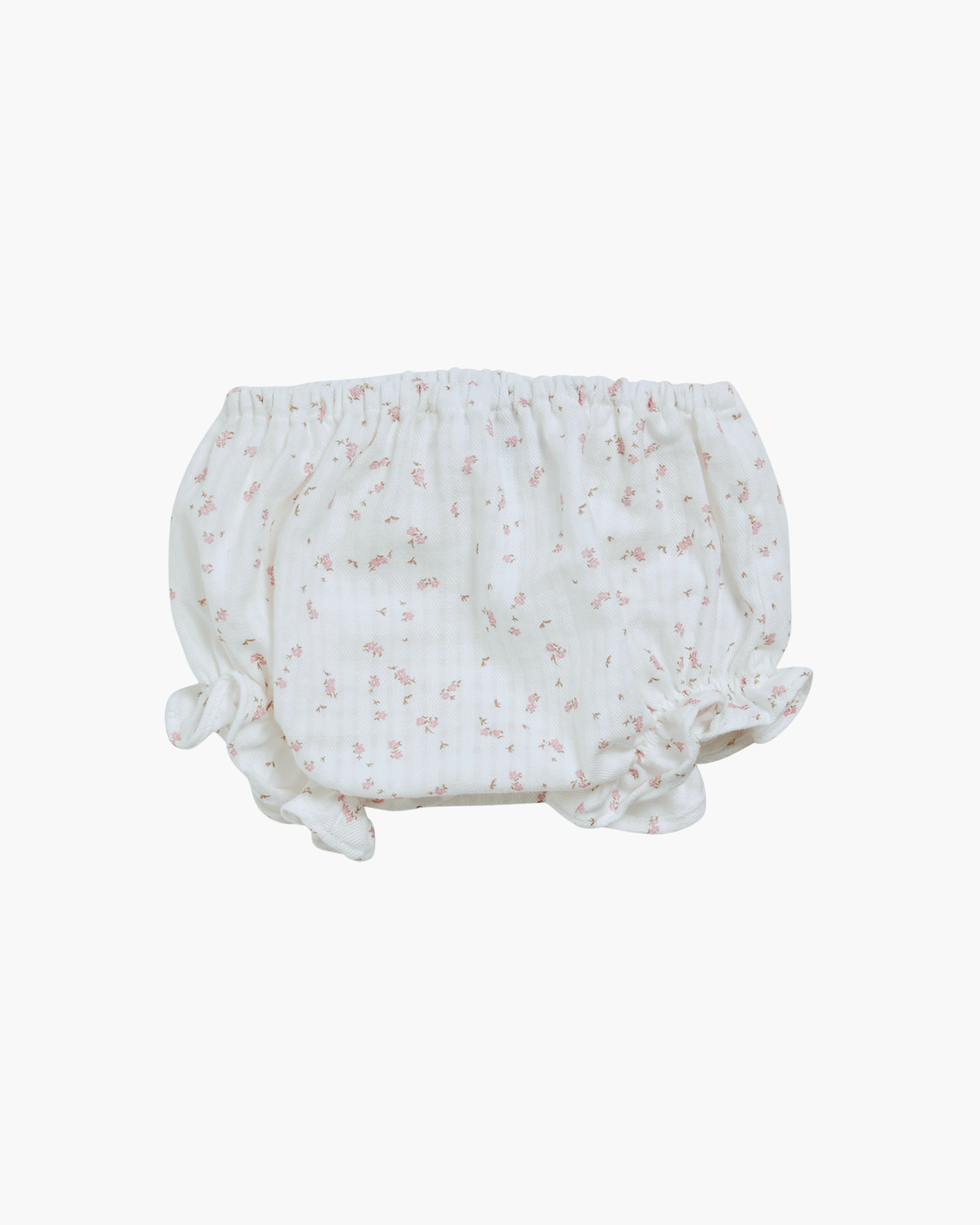 Floral-patterned baby bloomers on a white background