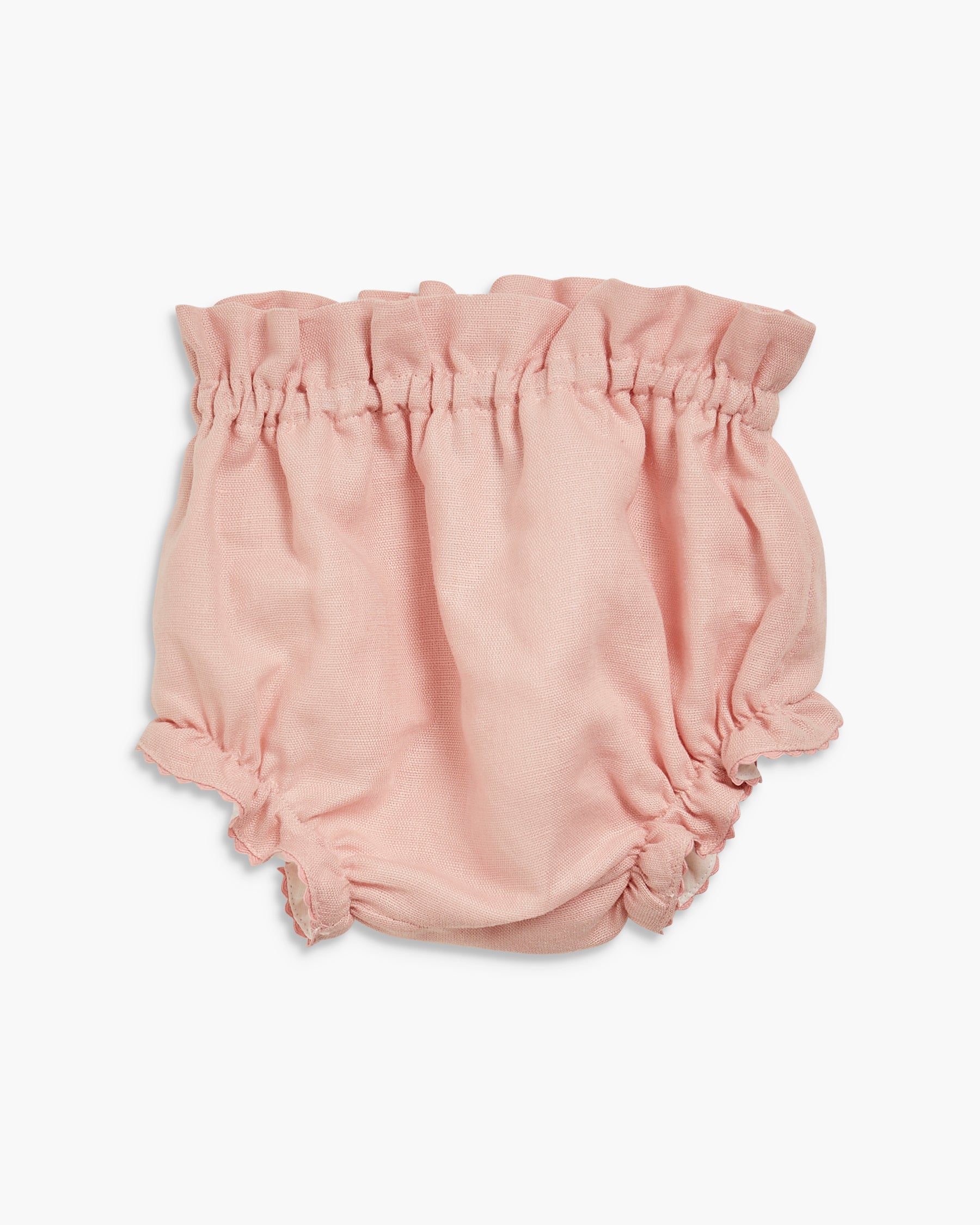 Pink baby bloomers on a white background