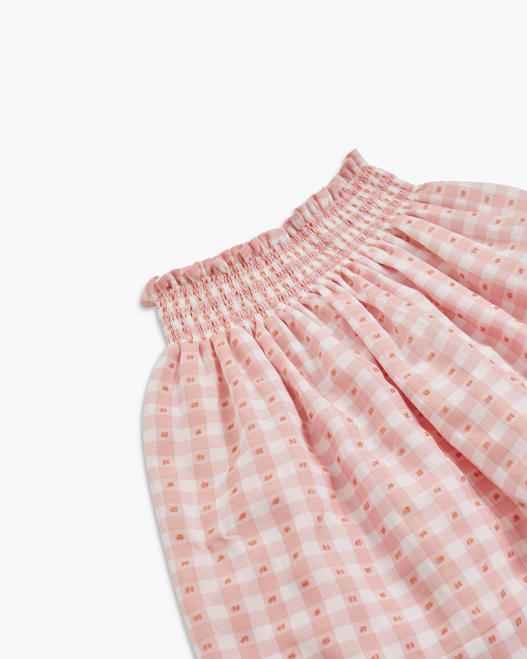 Pink checkered skirt on a white background