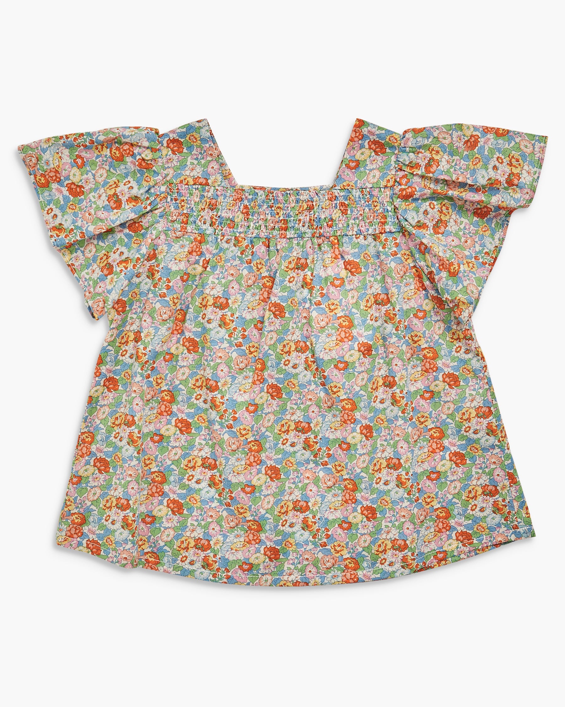 Floral patterned blouse with ruffled sleeves on a white background