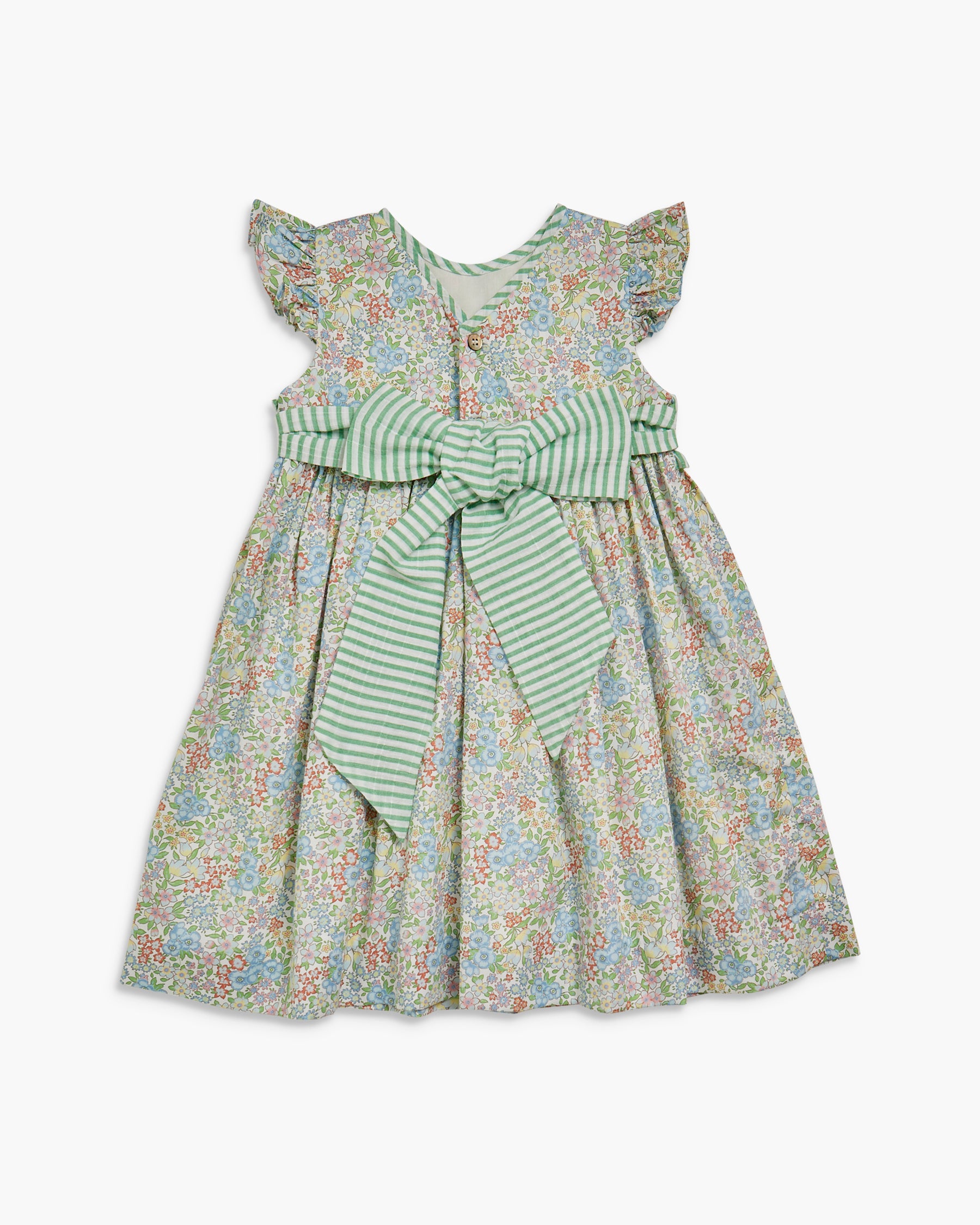Floral dress with a green bow on a white background