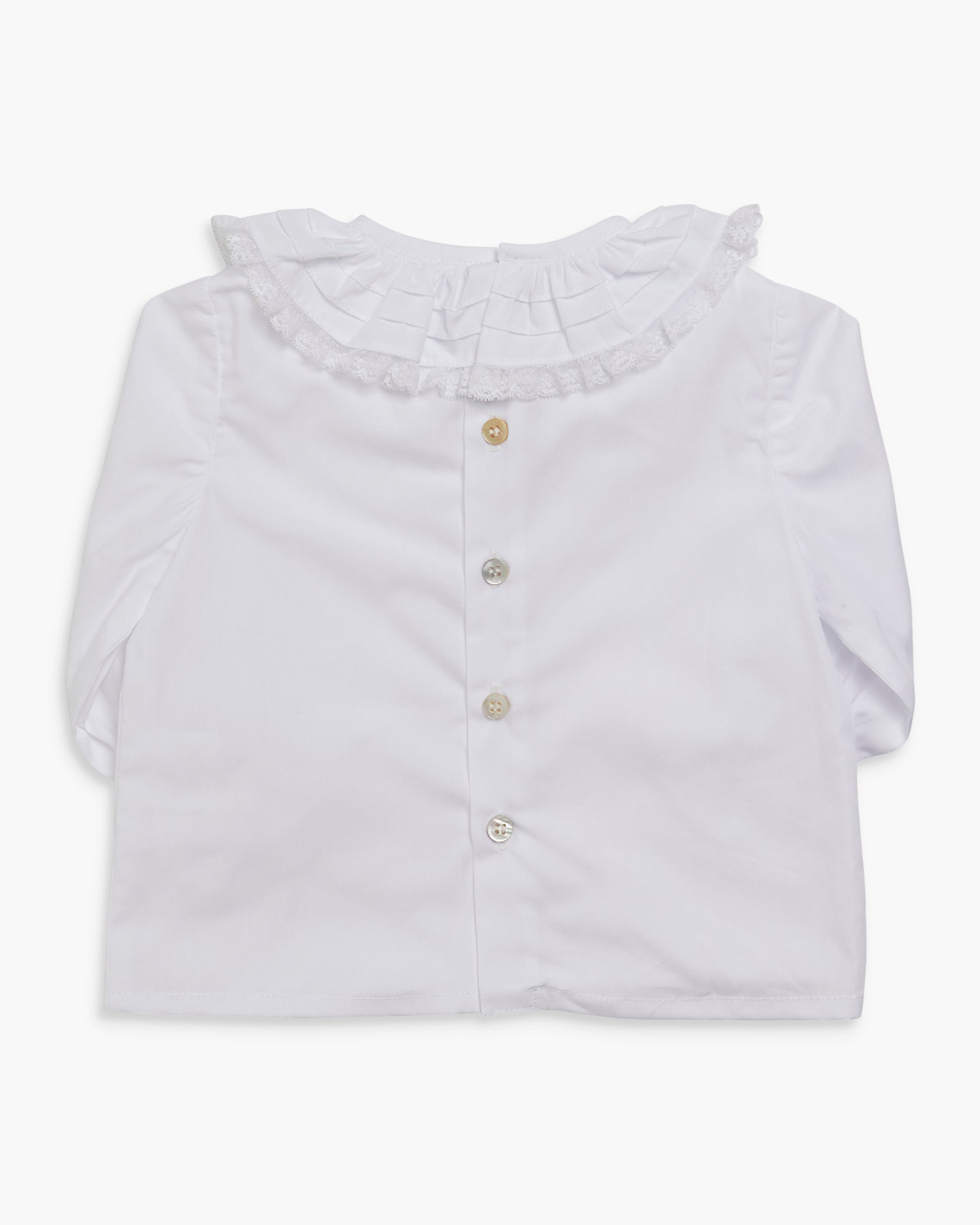 Folded light blue shirt with ruffled collar on a white background