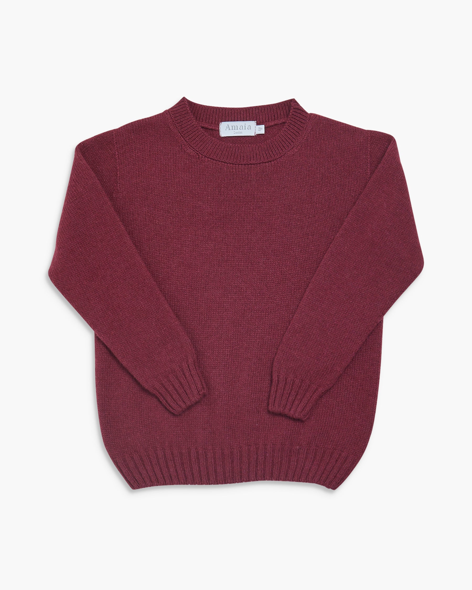 Maroon sweater on a white background