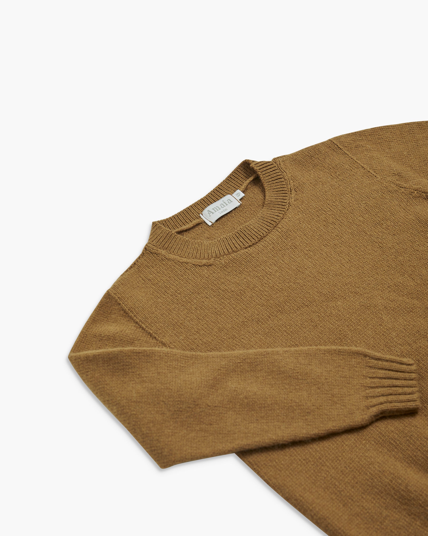 Brown sweater on a white background