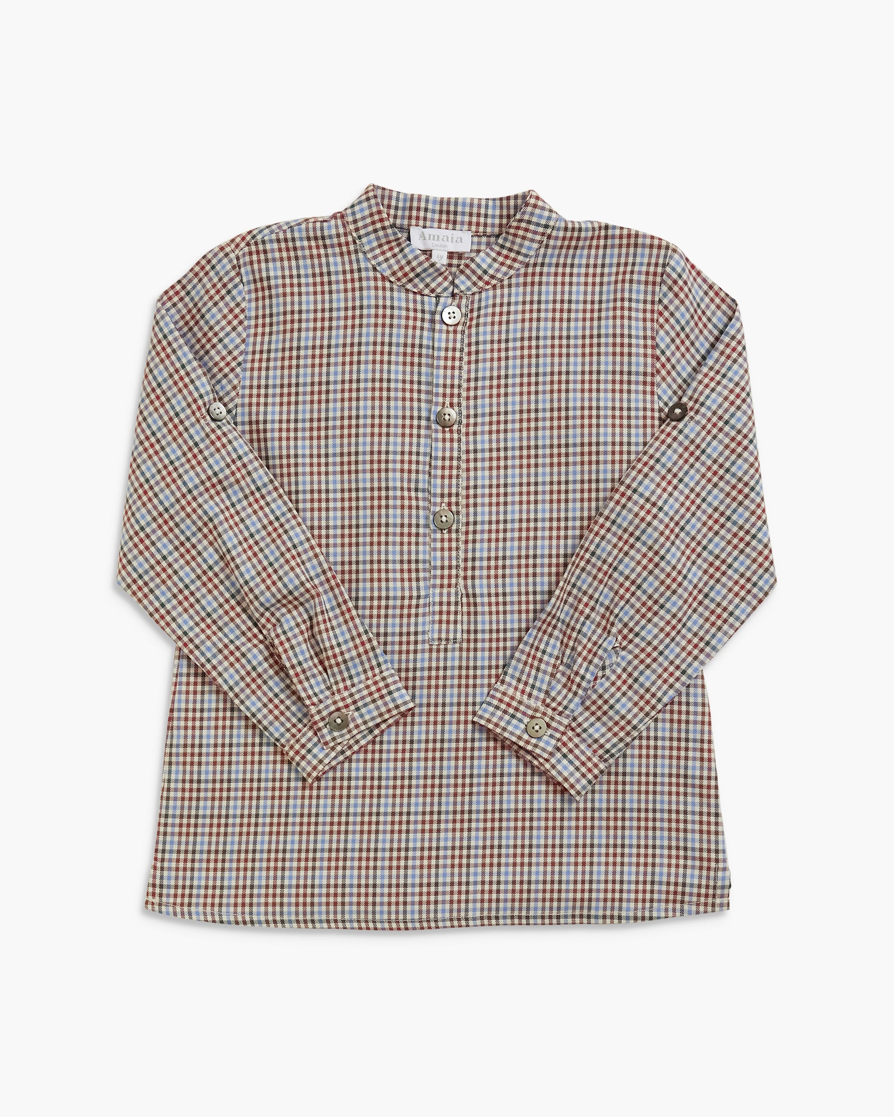 A long-sleeve button-up shirt with a brown, beige, and white plaid pattern, featuring a band collar and buttoned cuffs, laid flat against a light gray background.