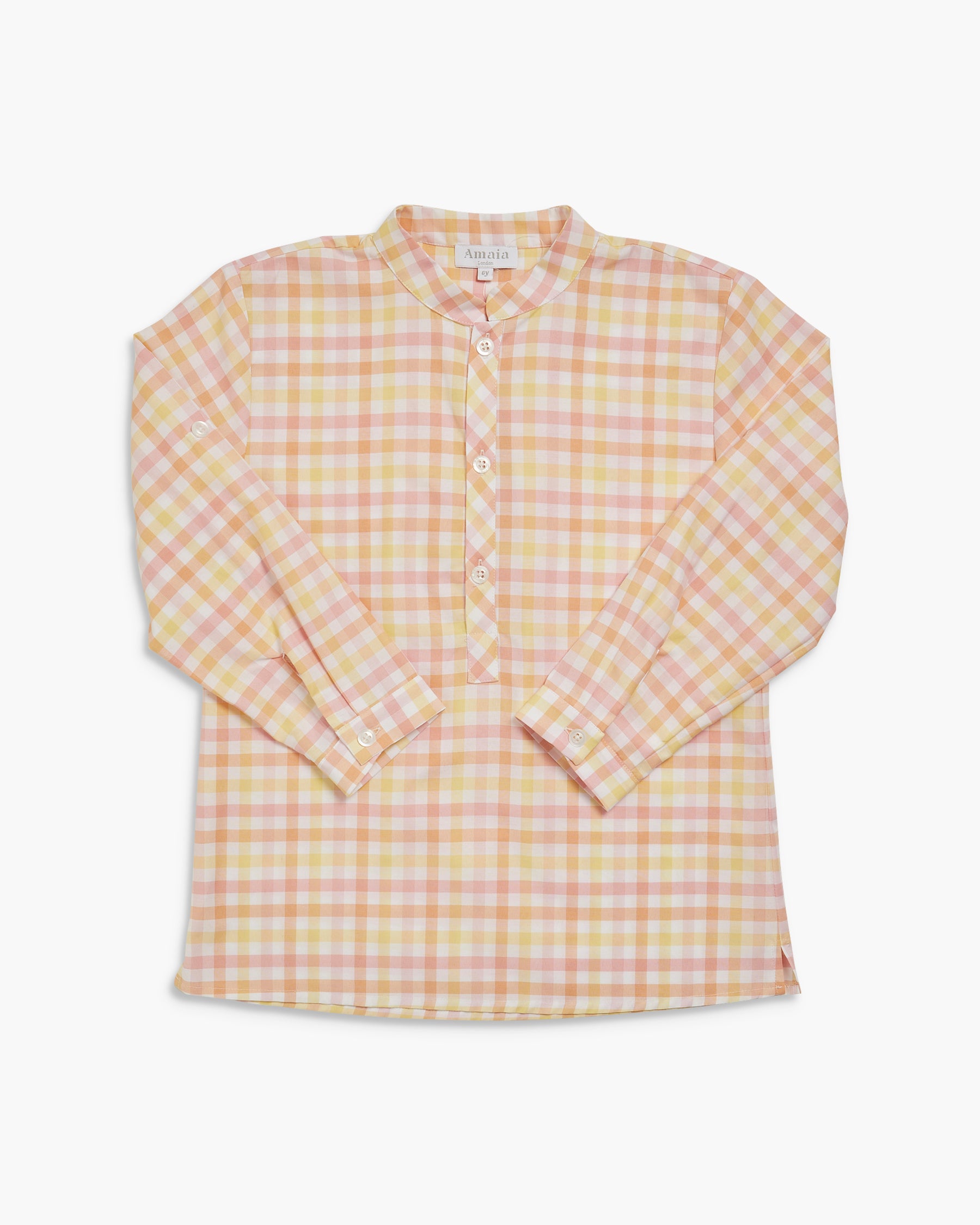 Yellow and pink checkered shirt on a white background