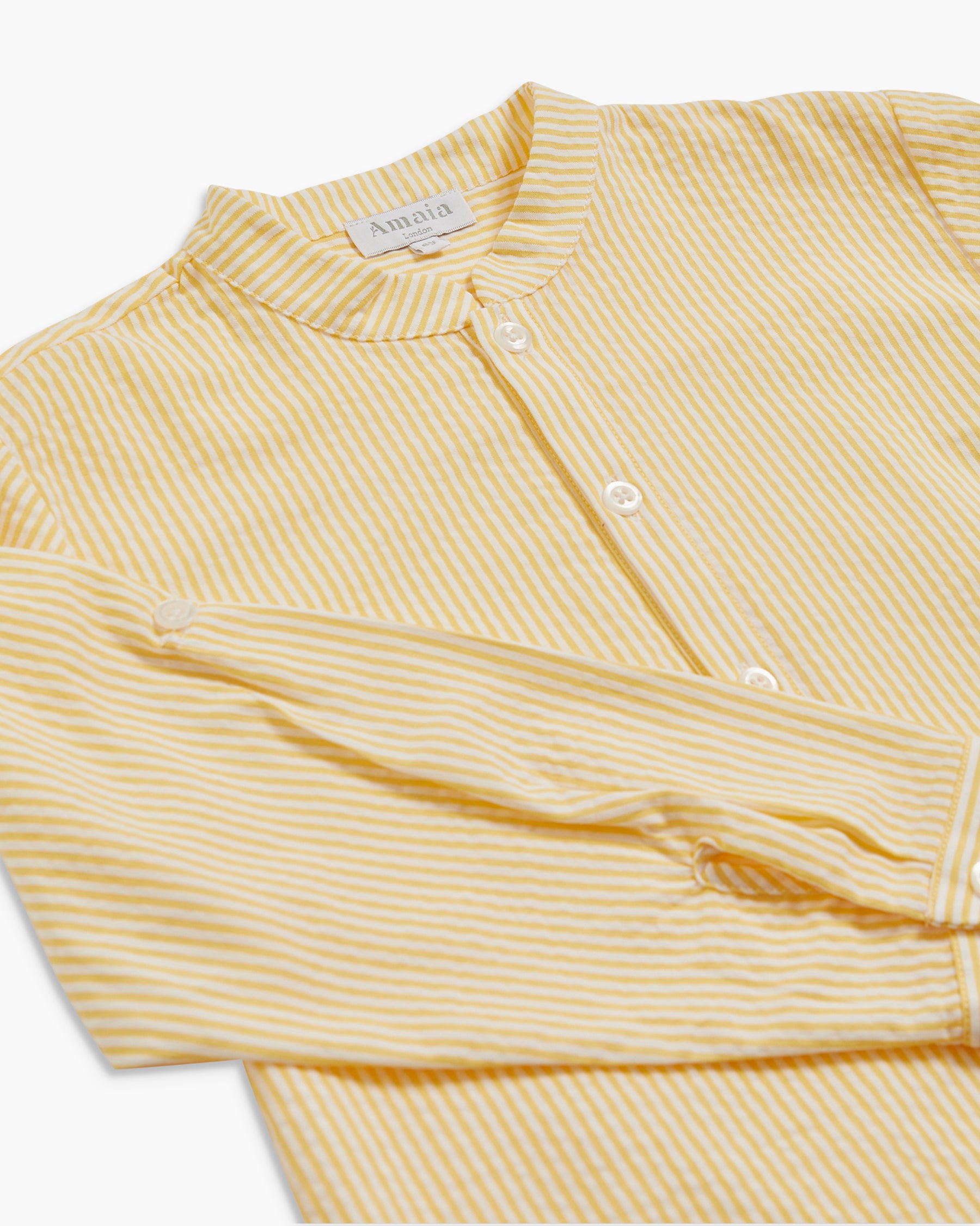Yellow striped shirt with a collar on a white background
