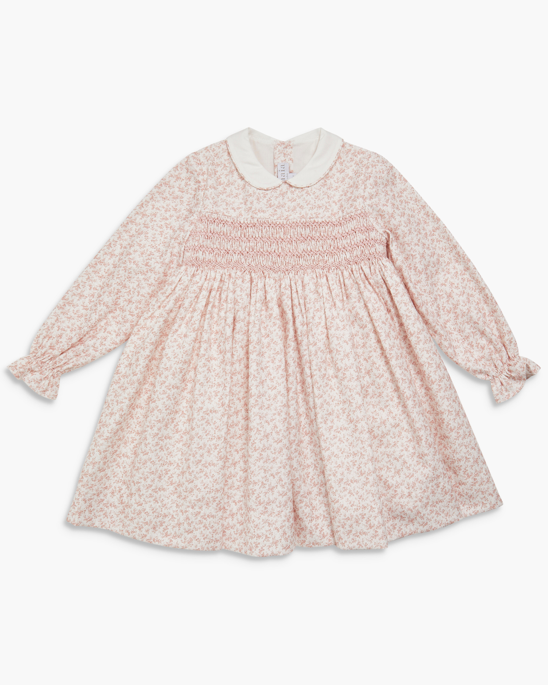 Pink floral dress with a white collar on a white background