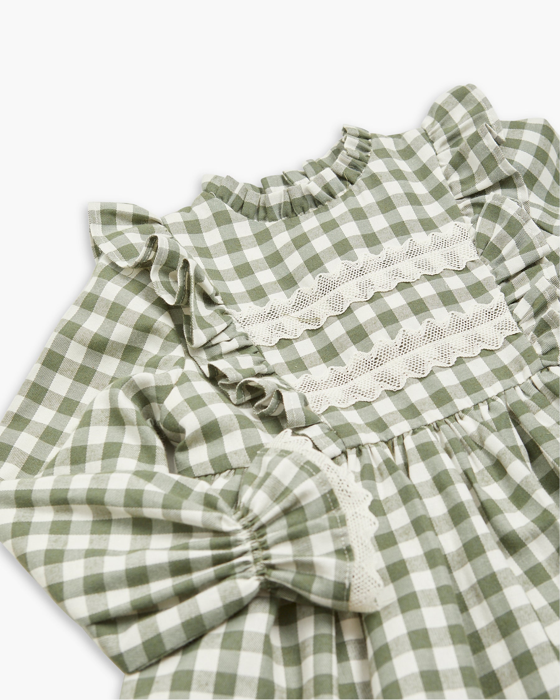 Green checkered dress with ruffled sleeves on a white background