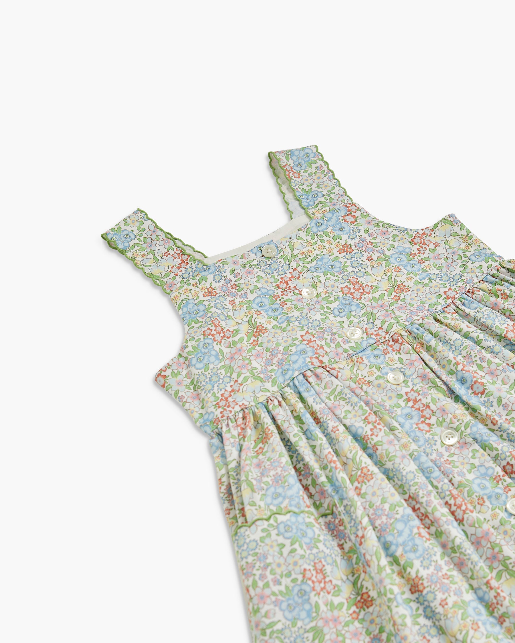 Floral patterned dress on a white background