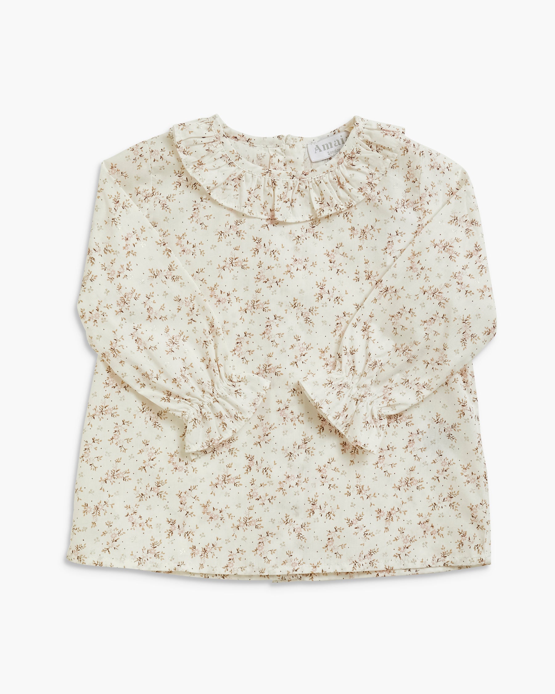 A long-sleeve blouse for girls featuring a delicate beige and brown floral print on an off-white base, with a ruffled collar and gathered elbow-length sleeves.