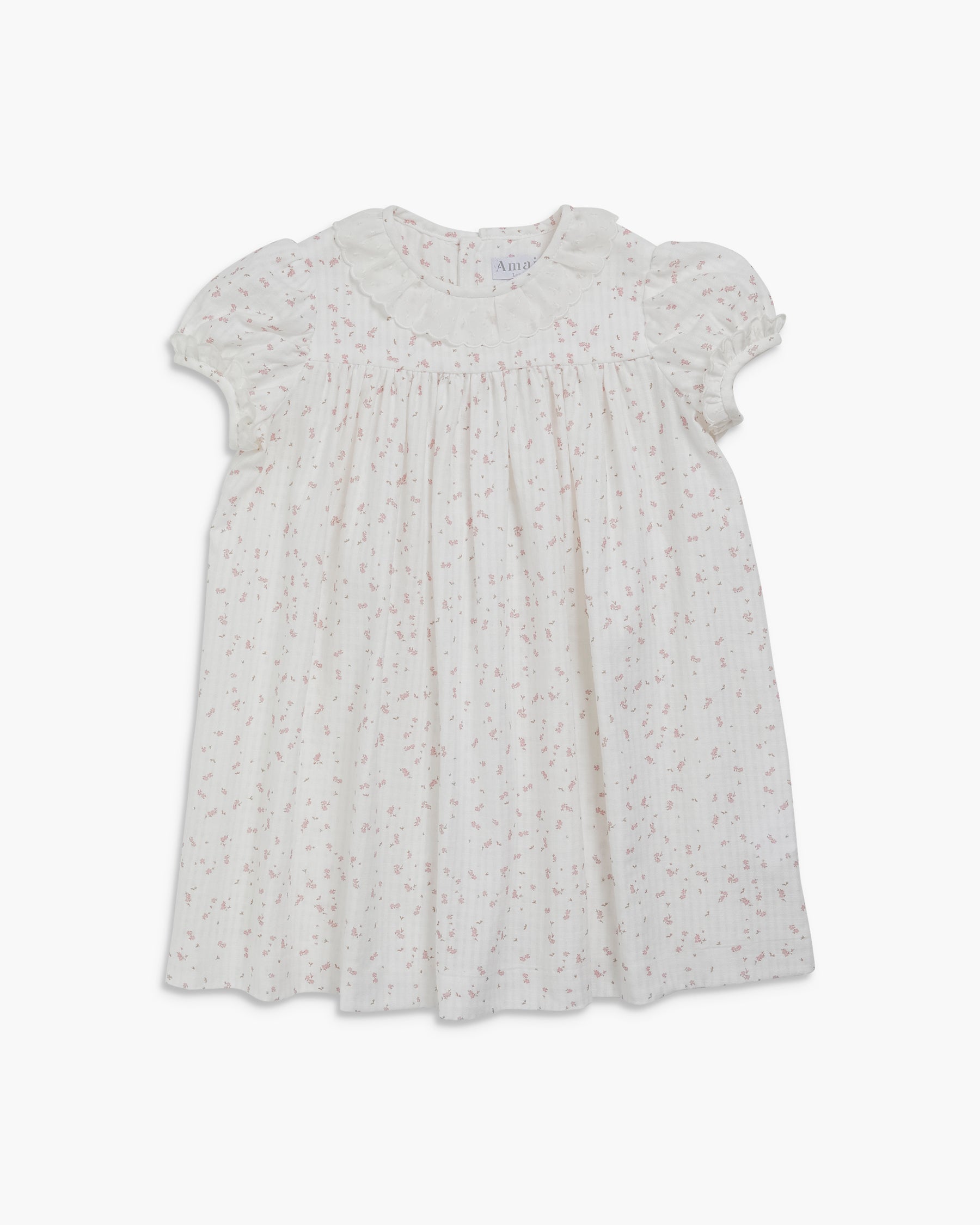 White dress with small pattern on a white background