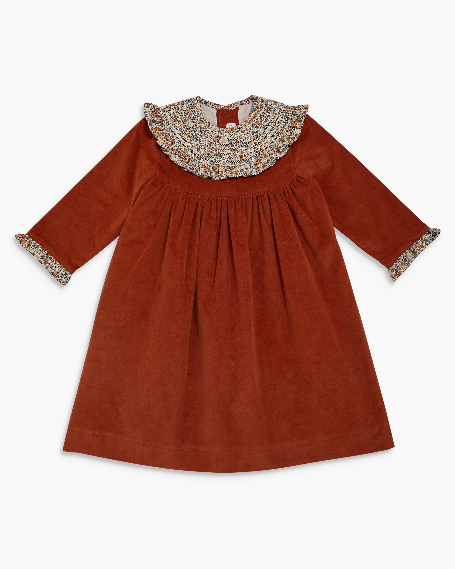 Brown dress with patterned collar on a white background