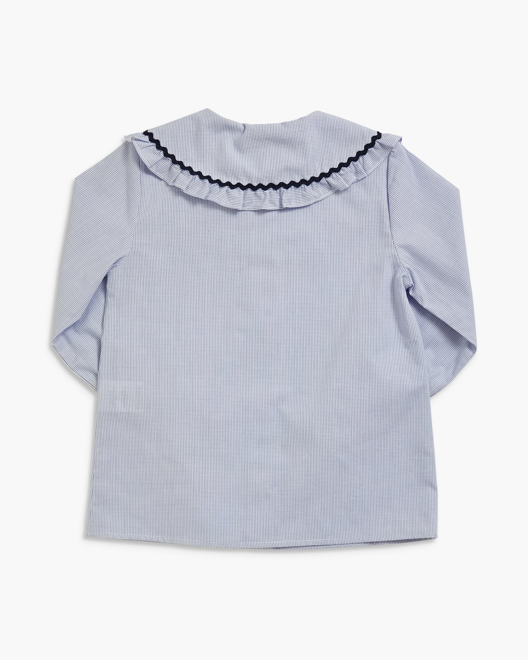 A light blue pinstriped long-sleeve blouse shown from the back, featuring a wide ruffled collar with a black scalloped trim, laid flat against a white background.