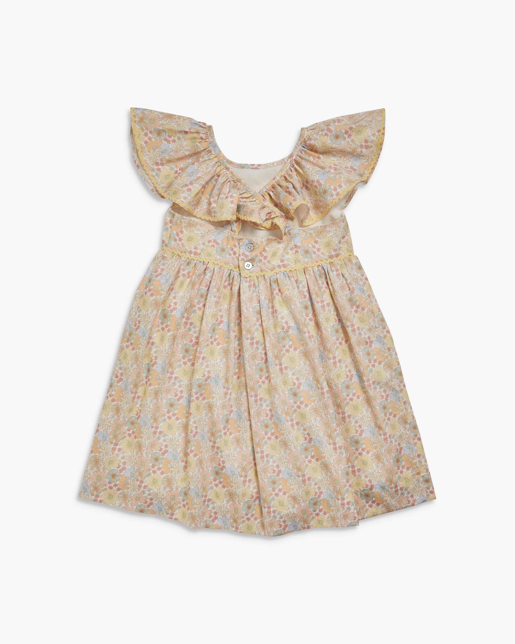 Floral dress with ruffled neckline on a white background