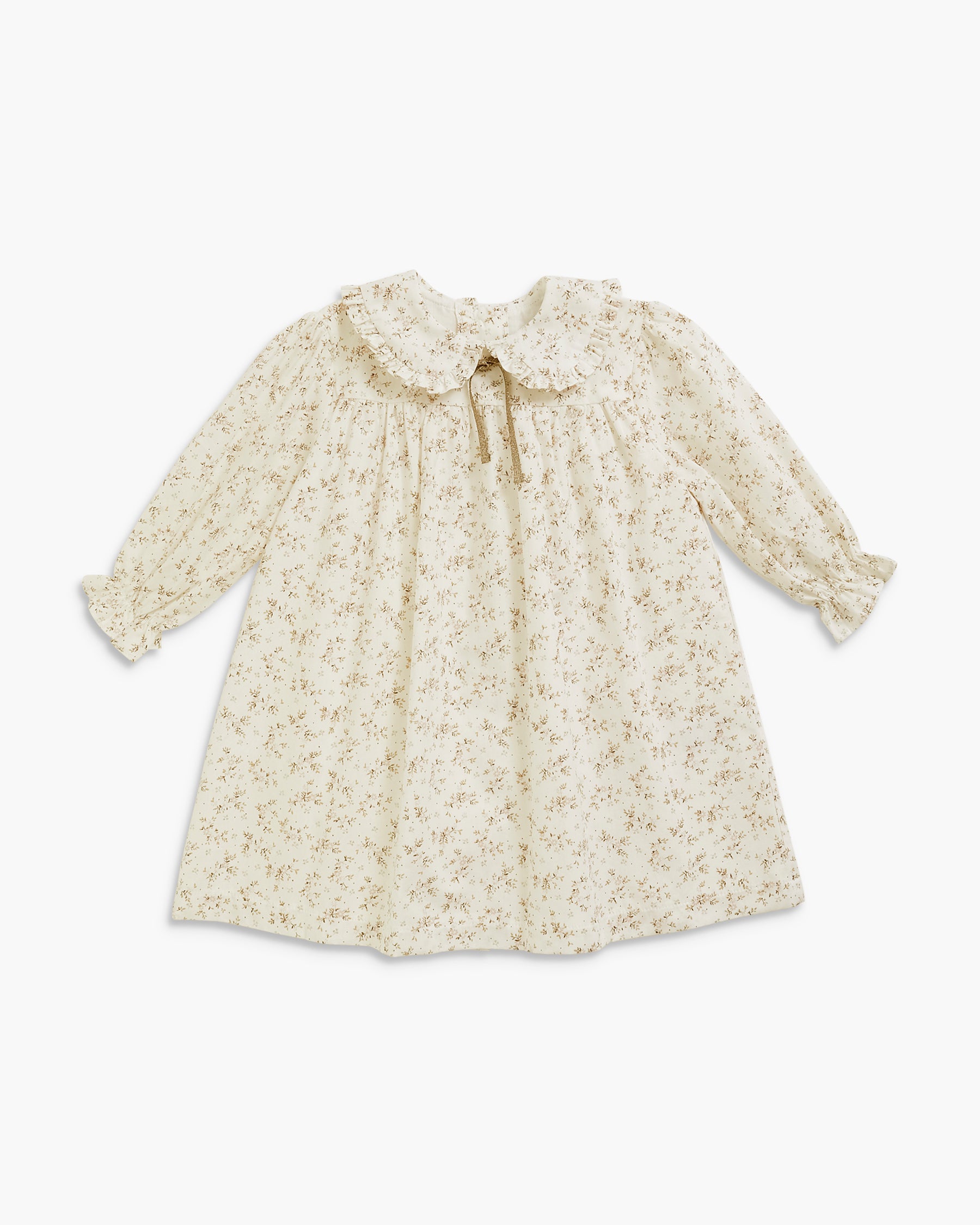 A cream-colored long-sleeve baby dress with a delicate all-over floral print, featuring a large ruffled collar and a small front tie, laid flat against a light gray background.