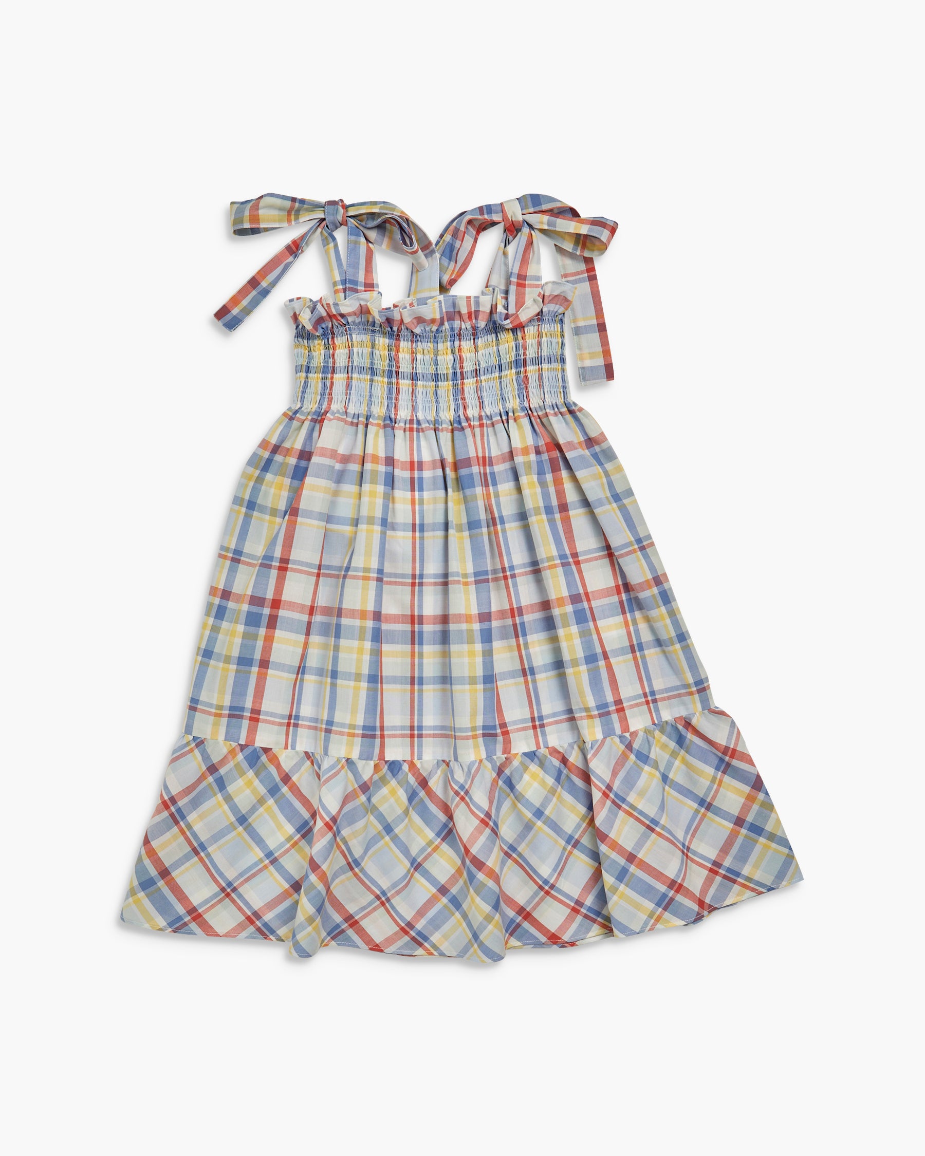 Plaid dress with ruffled hem on a white background
