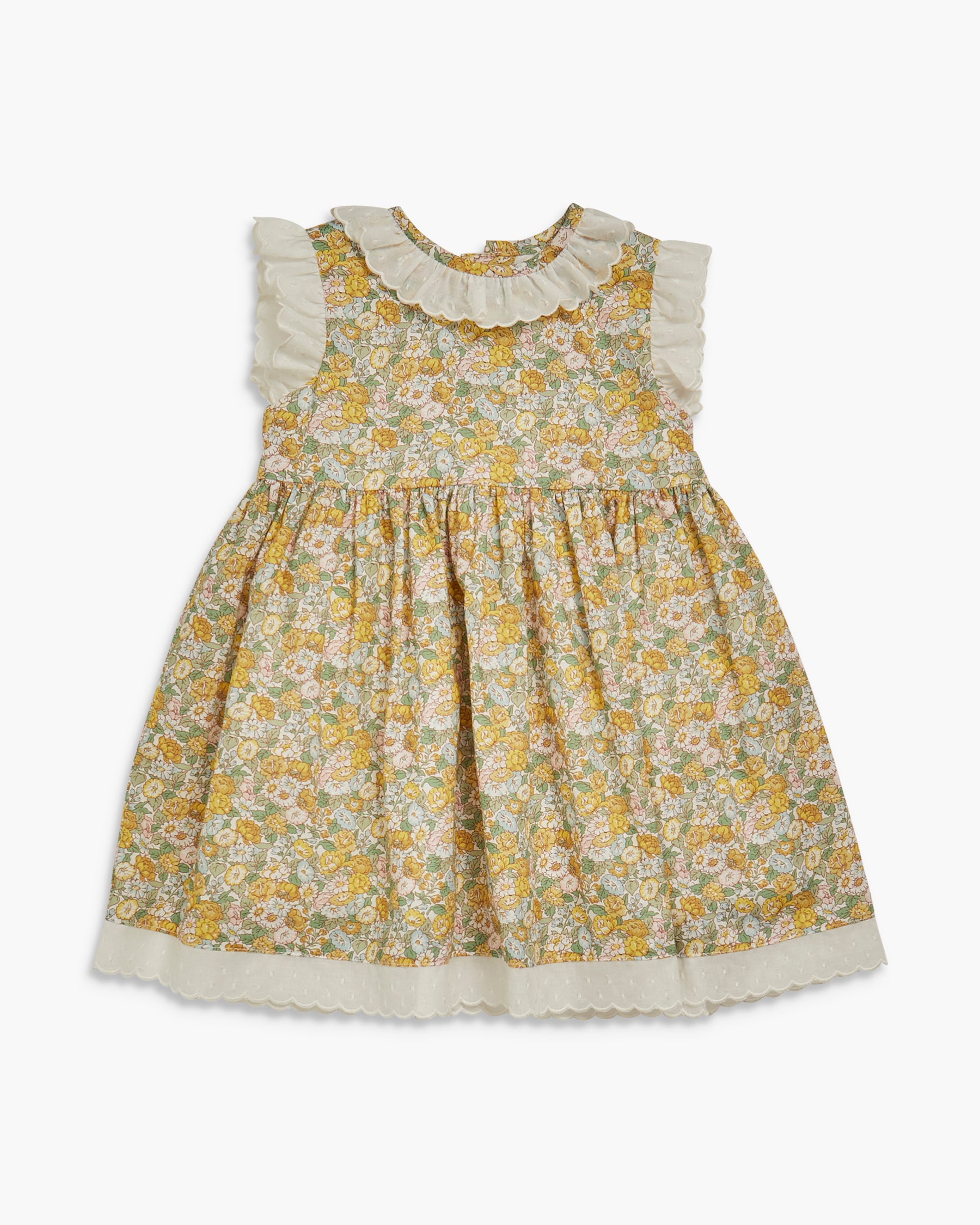 Yellow floral dress with lace trim on a white background