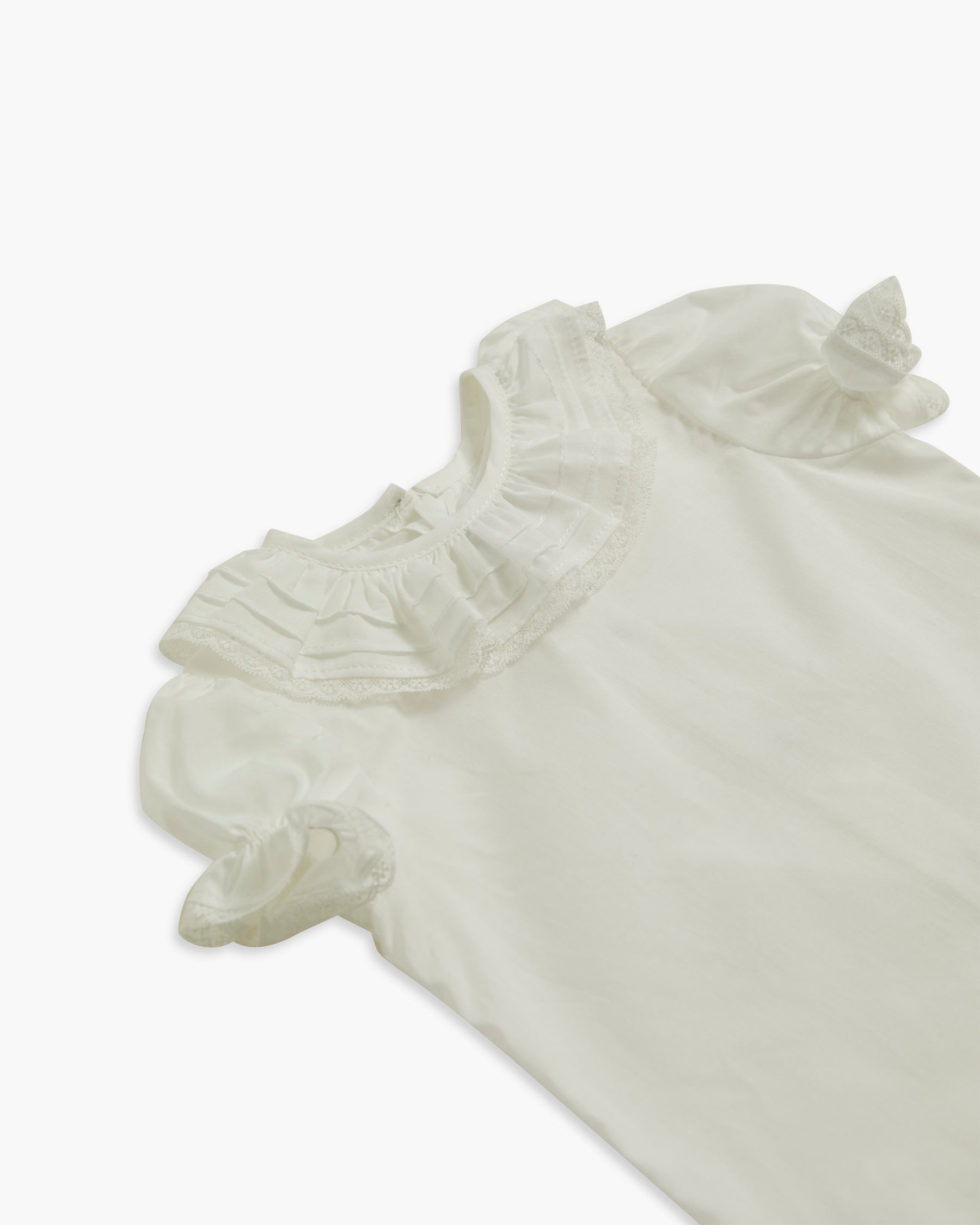 White ruffled fabric on a white background