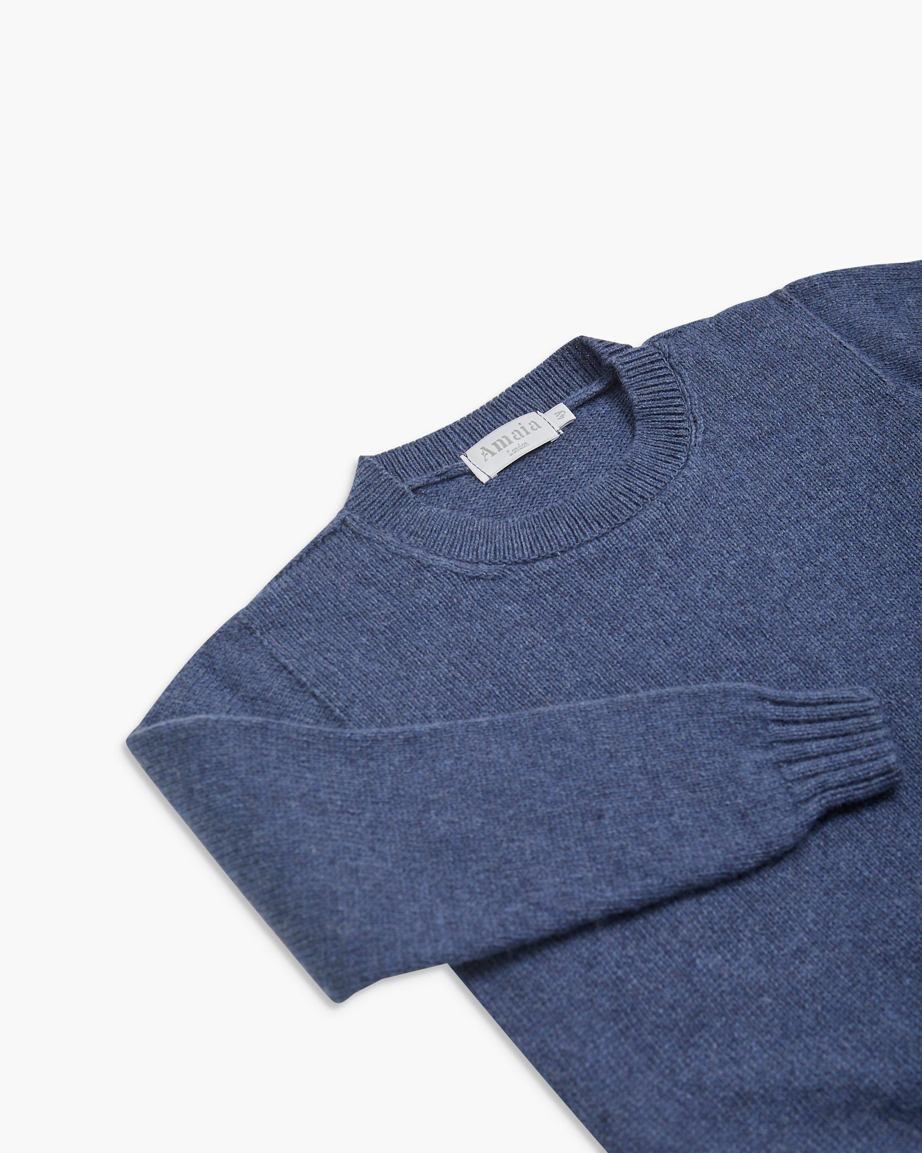 Blue sweater on a white background