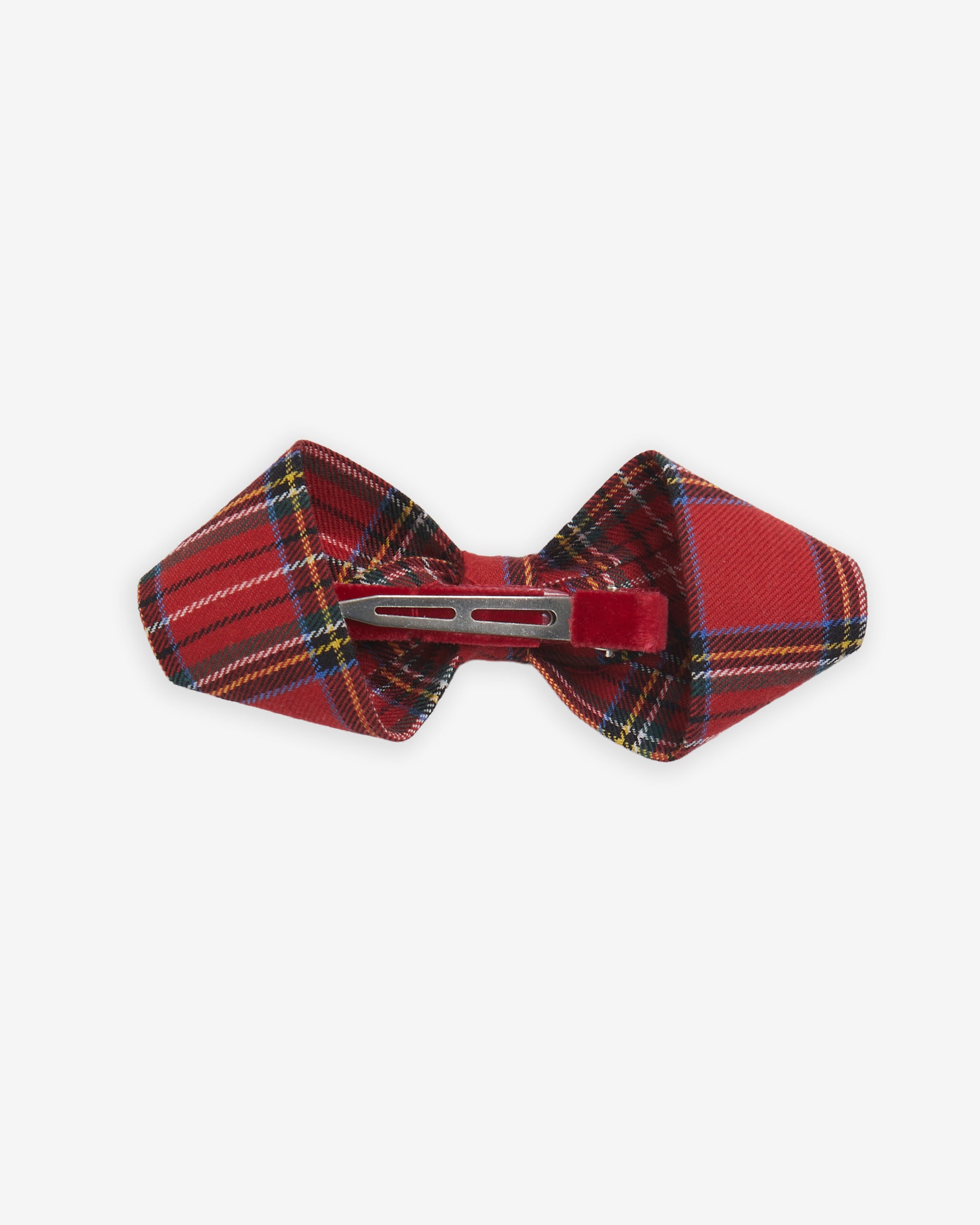 Plaid bow tie with a hair clip on a white background