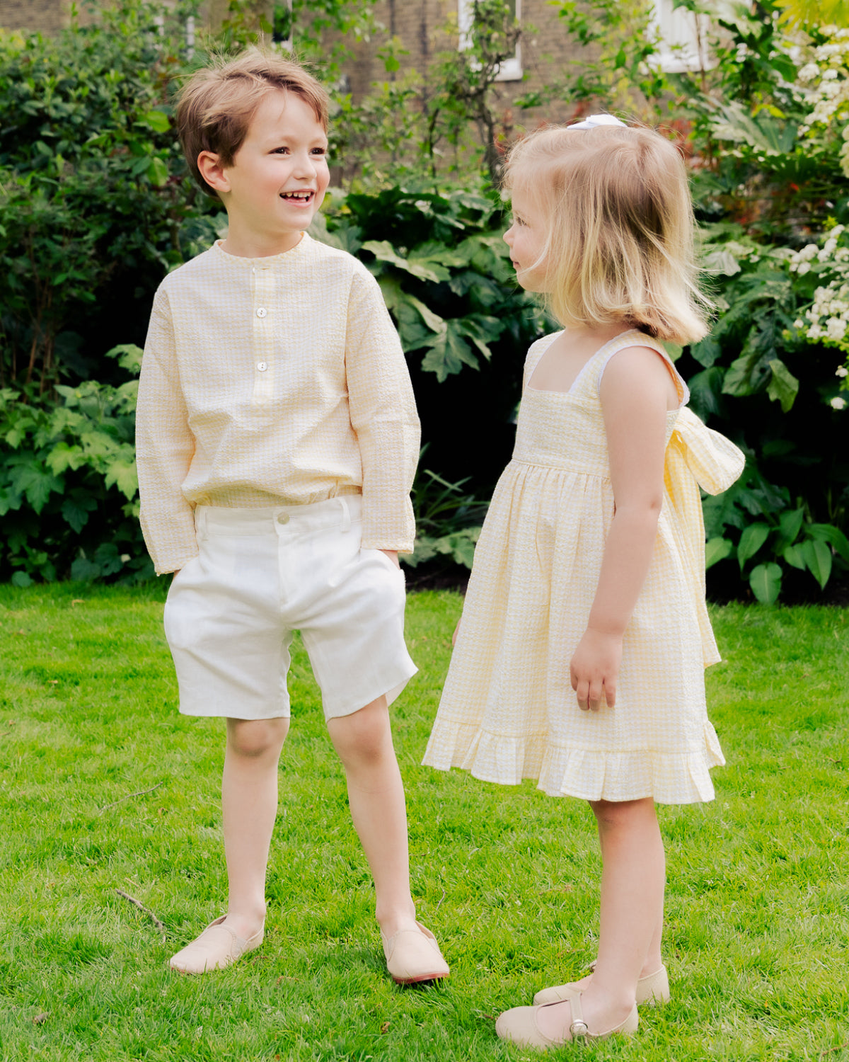 Young Boy wearing the off white short 